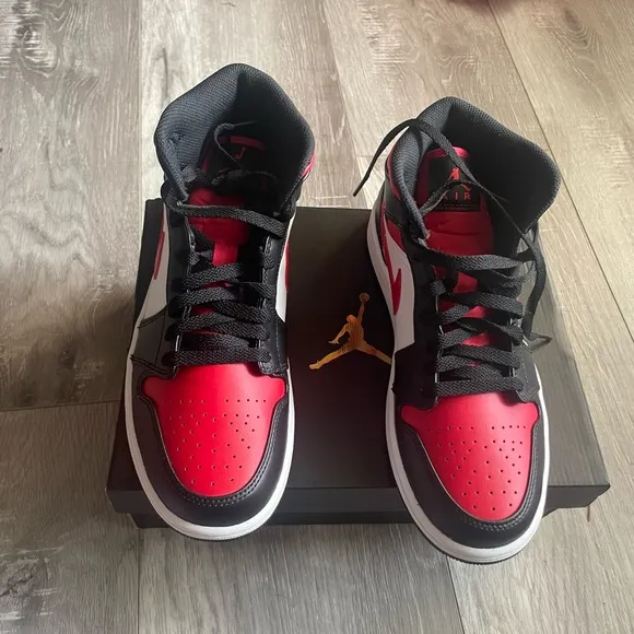 Air Jordan 1 mid-retro in red/black. Size 8.5 M