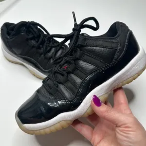 Air Jordan 11 Retro GS Black White Sail Sneakers