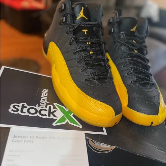 Air Jordan 12 Retro Black and Gold Sneakers