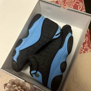Air Jordan 13 Retro Black and Blue Sneakers