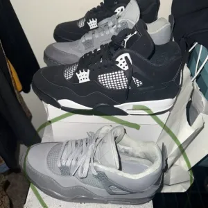 Air Jordan 4 Retro Sneakers in Black and Gray