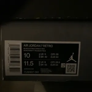 Air Jordan 7 Retro Black and Red Sneakers