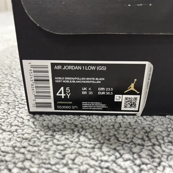 Air Jordan Low Sneakers in Black, White, and Green