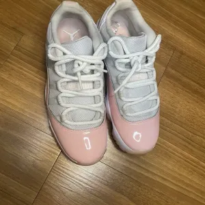 Air Jordan Pink and White Sneakers