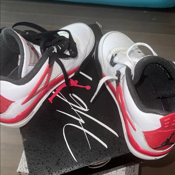 Air Jordan Retro 4 White and Black Sneakers