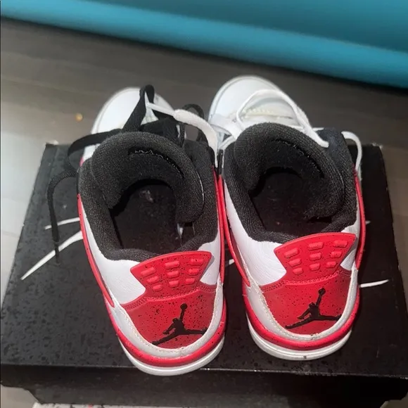 Air Jordan Retro 4 White and Black Sneakers
