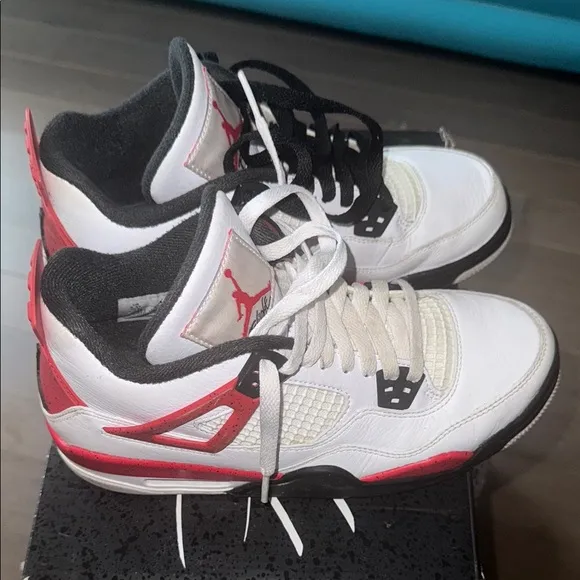 Air Jordan Retro 4 White and Black Sneakers