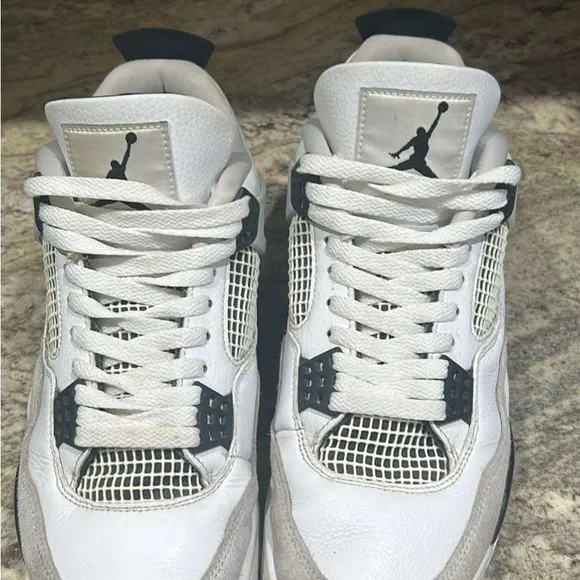 Air Jordan Retro 4 White and Black Sneakers