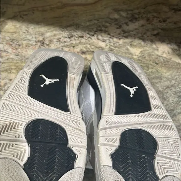 Air Jordan Retro 4 White and Black Sneakers