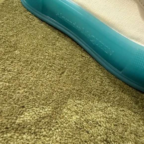 Alexander McQueen clean!!!! White Sneakers with sky Blue Soles worn once.
