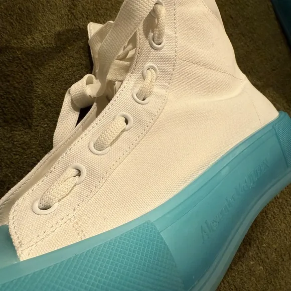 Alexander McQueen clean!!!! White Sneakers with sky Blue Soles worn once.