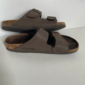 Birkenstock women’s size 8 or Men's size 6 Brown Sandals