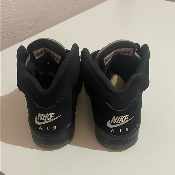 Black Air Jordan Sneakers with Red Accents