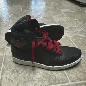 Black and Red Jordan Retro Sneakers