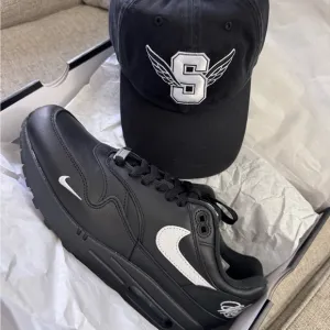 Black and White Nike Sneakers with Cap
