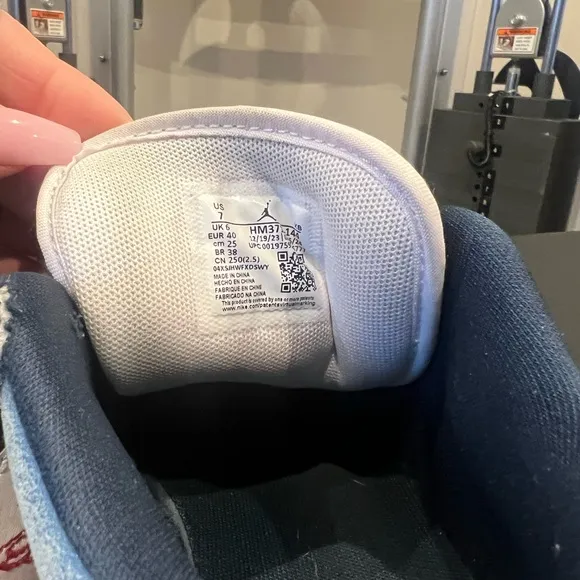 Blue and White Sneakers with Swoosh Logo