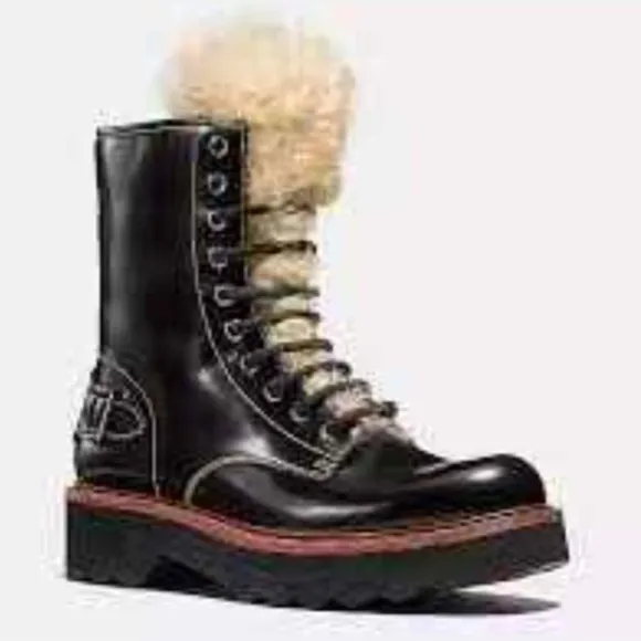 Coach woman’s black Moto Hiker boot with cream colored Shearling boots