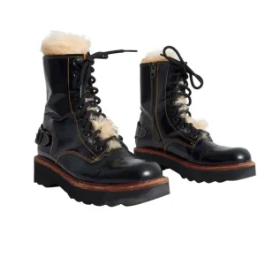 Coach woman’s black Moto Hiker boot with cream colored Shearling boots