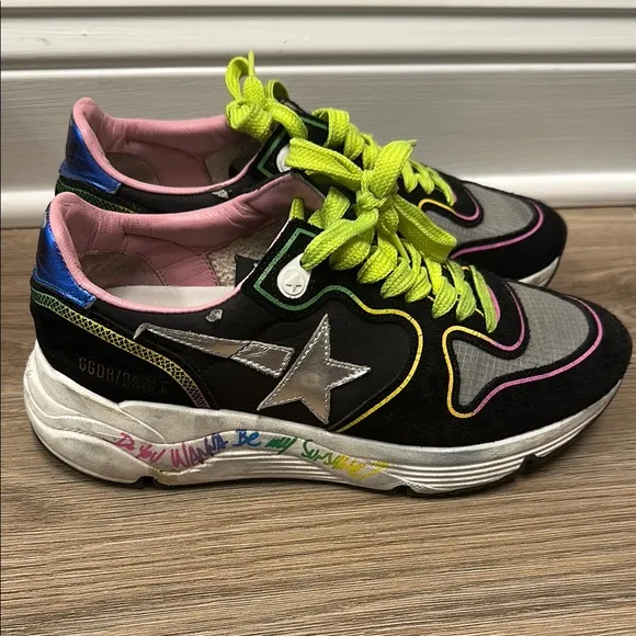 Golden Goose Black and Yellow Sneakers with Retro Vibes