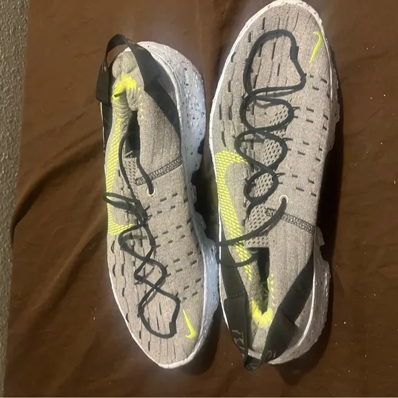 Gray and Yellow Athletic Sneaker Nike Space Hippie fits men size 10.5
