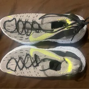 Gray and Yellow Athletic Sneaker Nike Space Hippie fits men size 10.5