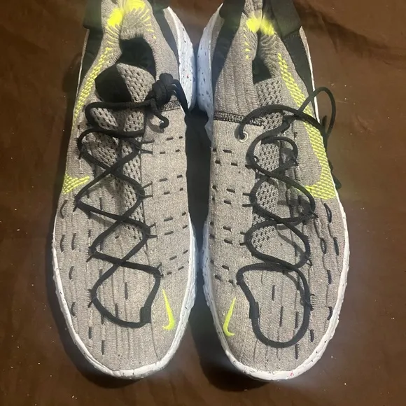Gray and Yellow Athletic Sneaker Nike Space Hippie fits men size 10.5