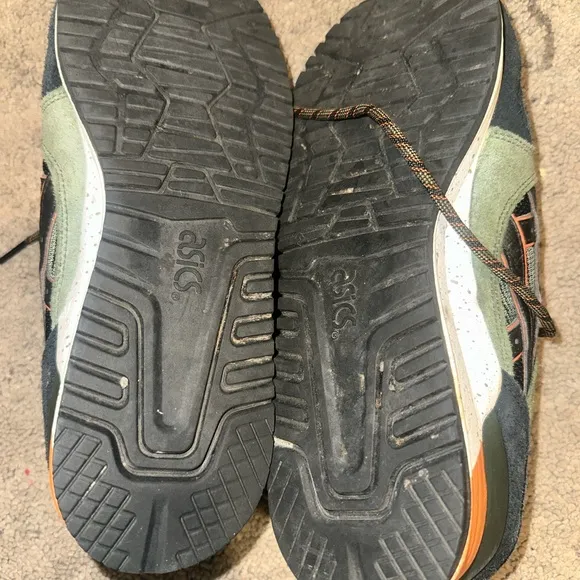 Green and Black Sneakers with Orange Accents