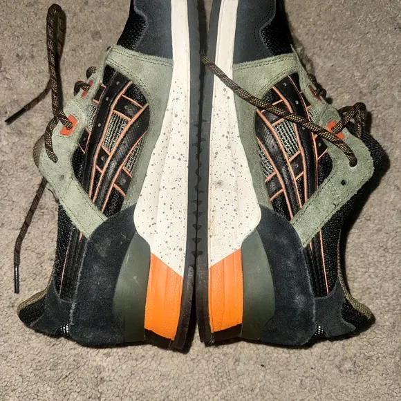 Green and Black Sneakers with Orange Accents