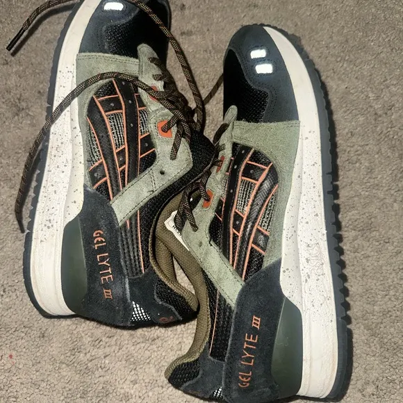 Green and Black Sneakers with Orange Accents