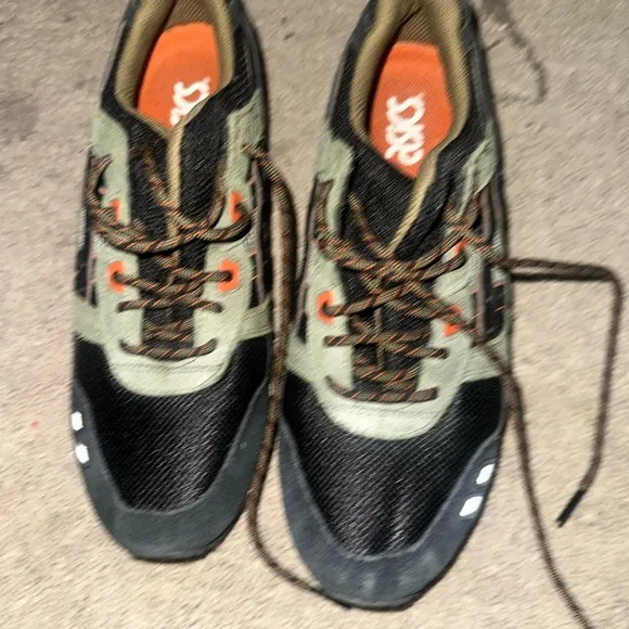 Green and Black Sneakers with Orange Accents