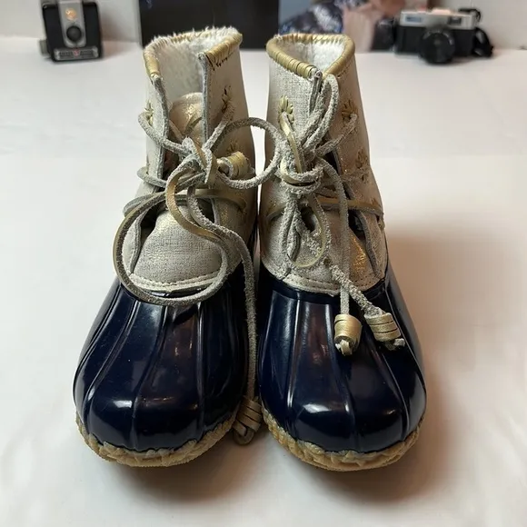 Jack Rodgers Chloe Rain/ snow boots with a whipstitch blue and gold .