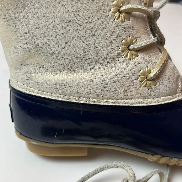 Jack Rodgers Chloe Rain/ snow boots with a whipstitch blue and gold .