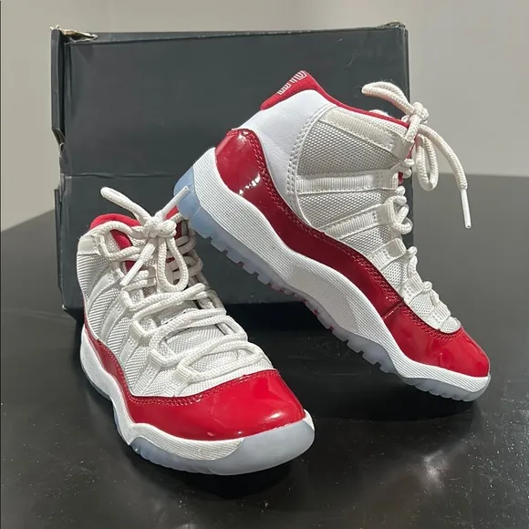 JORDAN 11 RETRO Kid’s Jordan Red and White Sneakers
