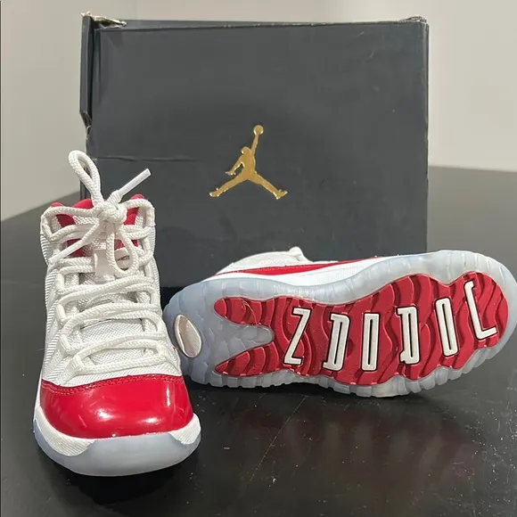 JORDAN 11 RETRO Kid’s Jordan Red and White Sneakers