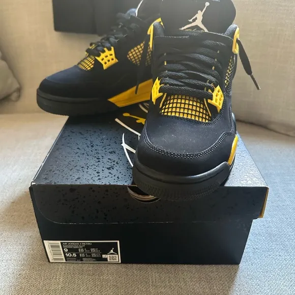 Jordan 4 a Retro Black and Yellow Sneakers