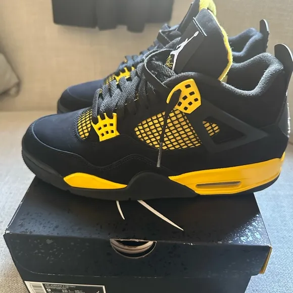 Jordan 4 a Retro Black and Yellow Sneakers
