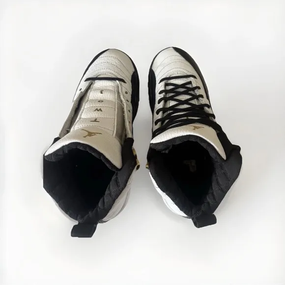 Jordan Retro 12 Sneakers Royalty Taxi - Black and White size 4