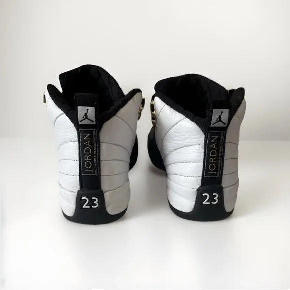 Jordan Retro 12 Sneakers Royalty Taxi - Black and White size 4