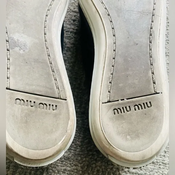 MIU MIU Women’s Black Leather Flats With Silver Toe Cap