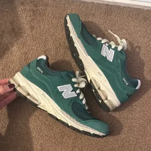 New Balance Green Sneakers- New Balance 2002R Night watch Green
