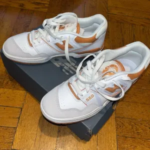 New Balance White and Orange Sneakers