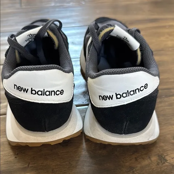 New Balance women’s 237 retro Black and White Sneakers