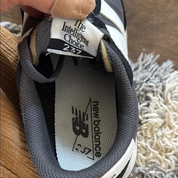 New Balance women’s 237 retro Black and White Sneakers