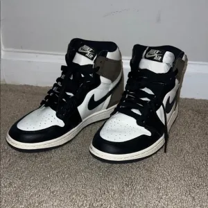 Nike Air Black and White High-Top Sneakers