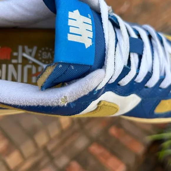 NIKE AIR FORCE 1 Undefeated Blue and Yellow Sneakers