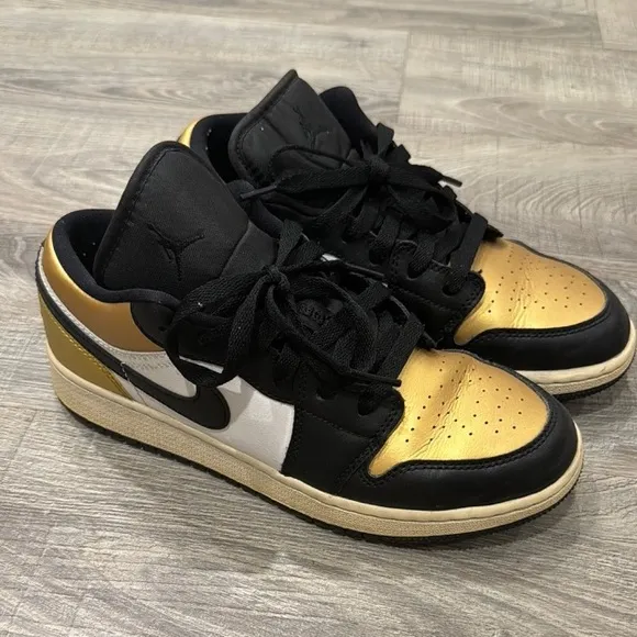 Nike Air Jordan 1 Low Black and Gold Sneakers
