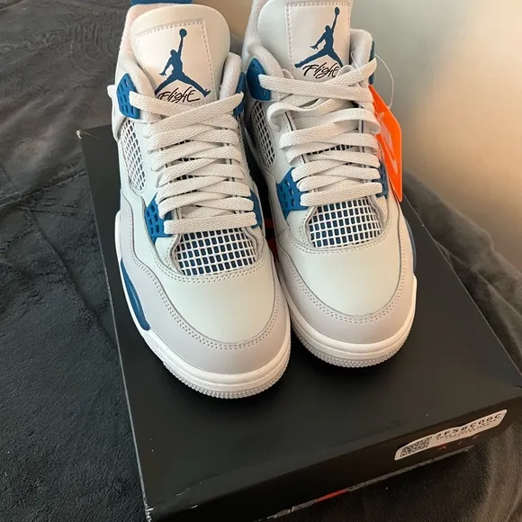 Nike Air Jordan 4 Retro White and Blue Sneakers