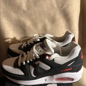 Nike Air Max Black and White Sneakers 6.5 Y, 8 W