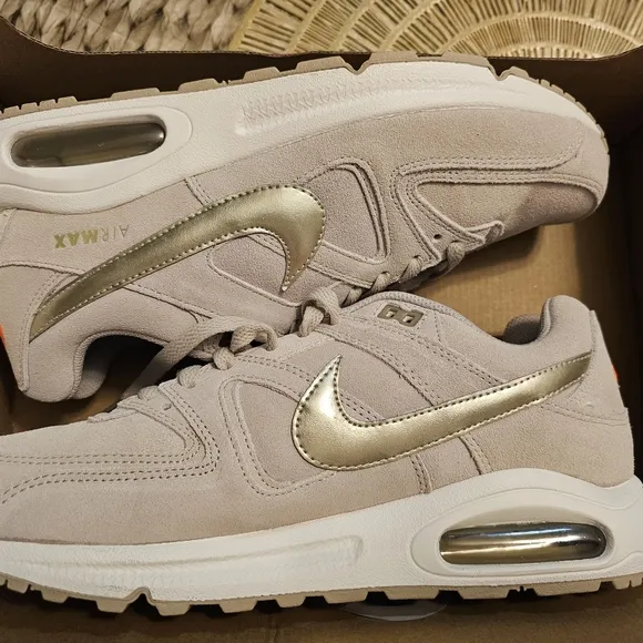 Nike Beige Sneakers with Gold Swoosh