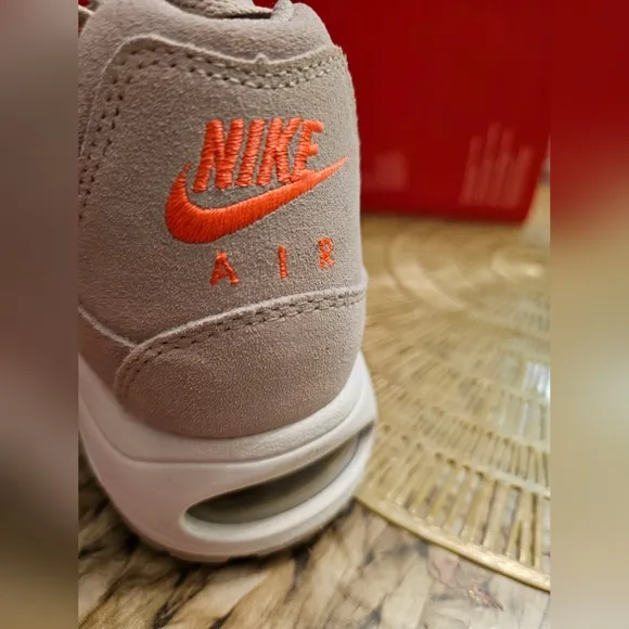 Nike Beige Sneakers with Gold Swoosh